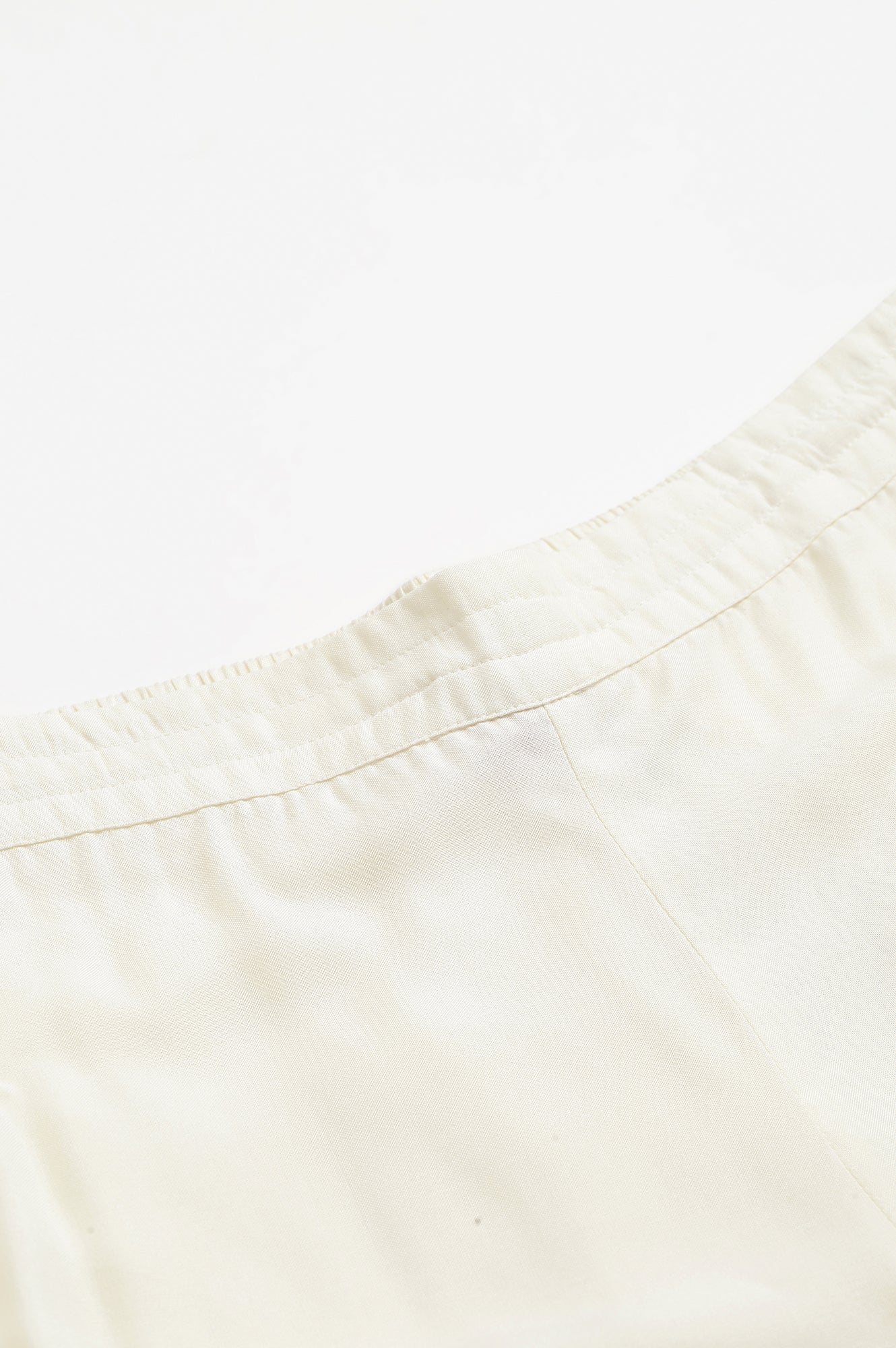 W for Woman Ecru Embroidered Rayon Parallel Pants With Pleats.