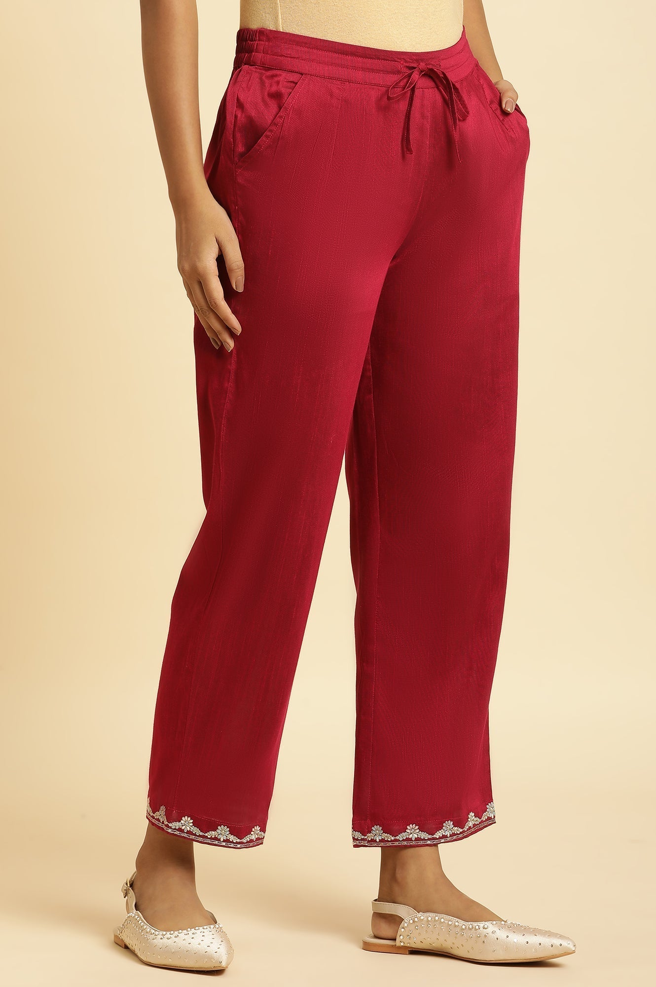 W for Woman Magenta Solid Pants With Embroidery On Hem
