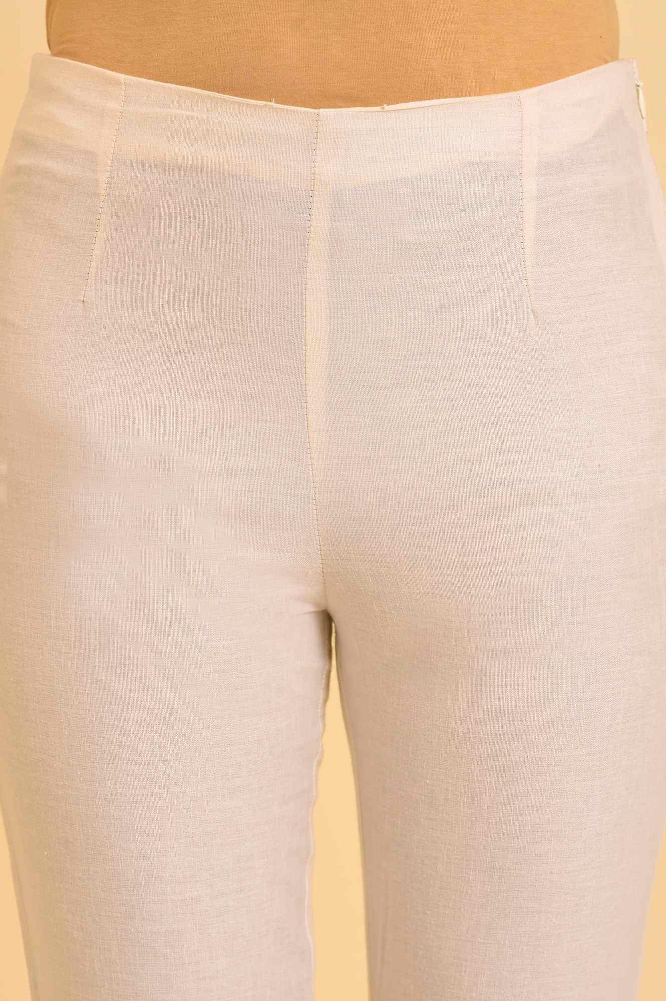 W for Woman Ecru Solid Slim Pants With Lace On Hem