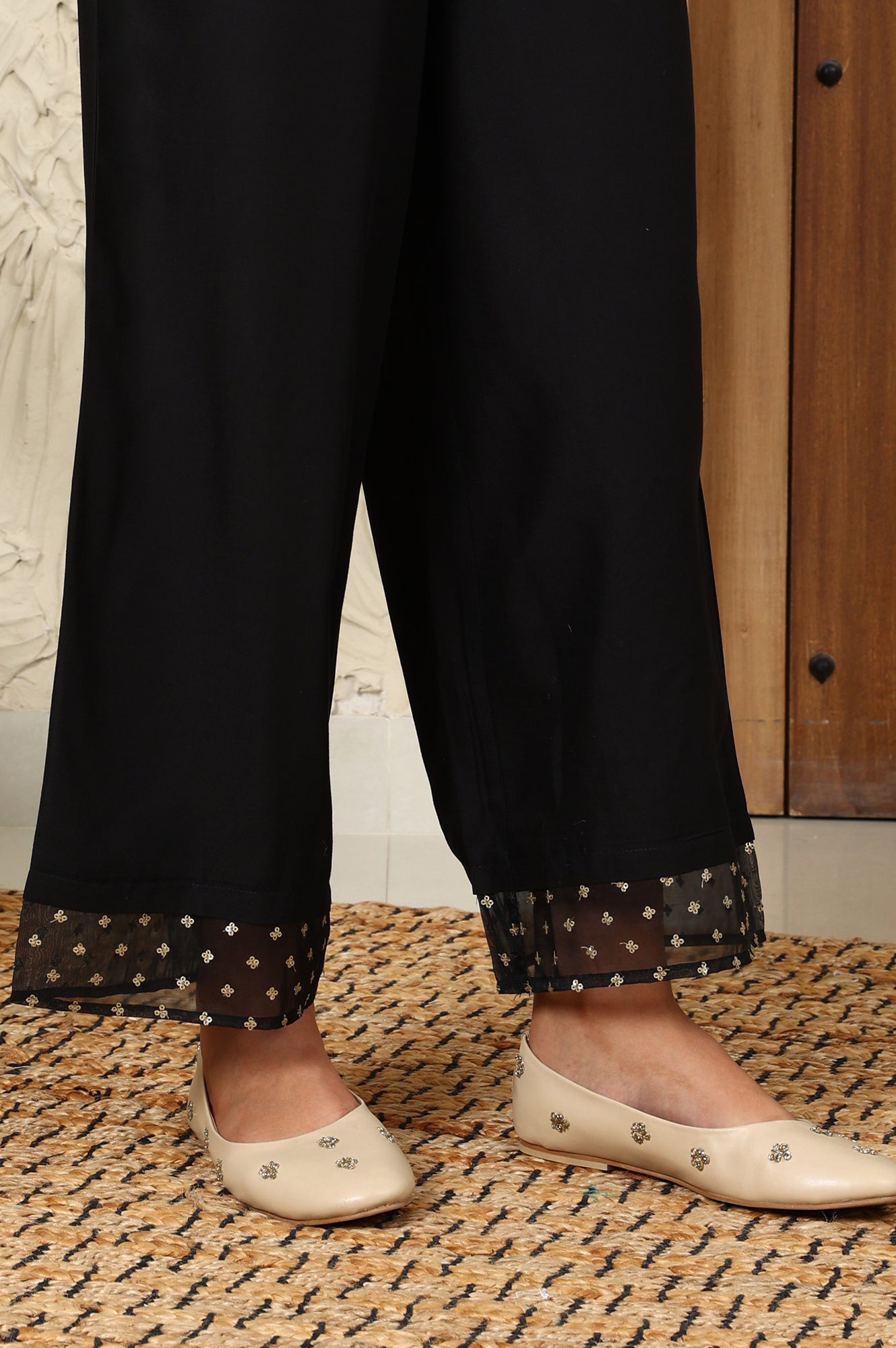 W for Woman Black Solid Rayon Parallel Pants With Embellished Organza Hemline