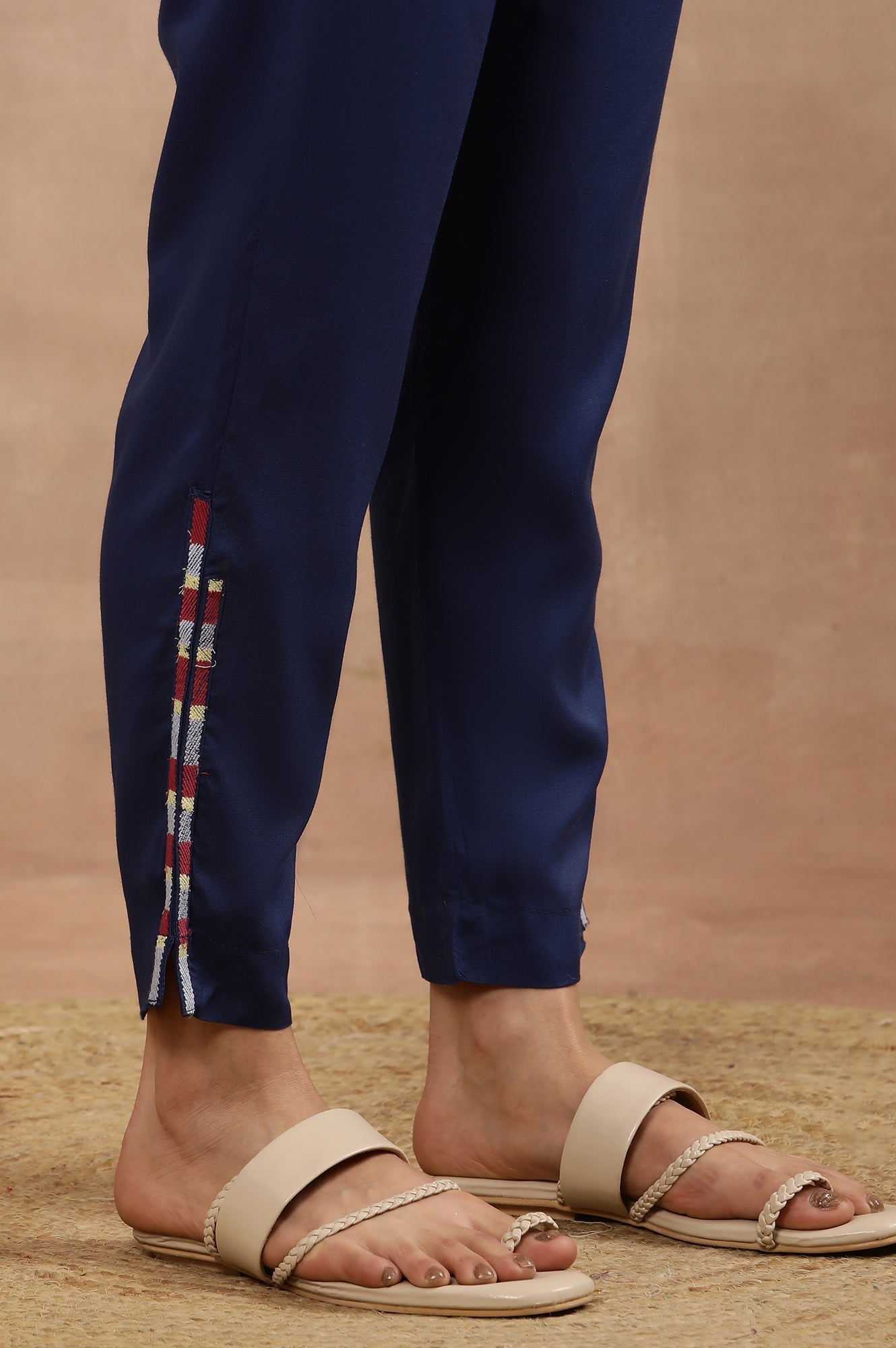 W for Woman Green Printed Asymmetrical Kurta And Blue Slim Pants Set