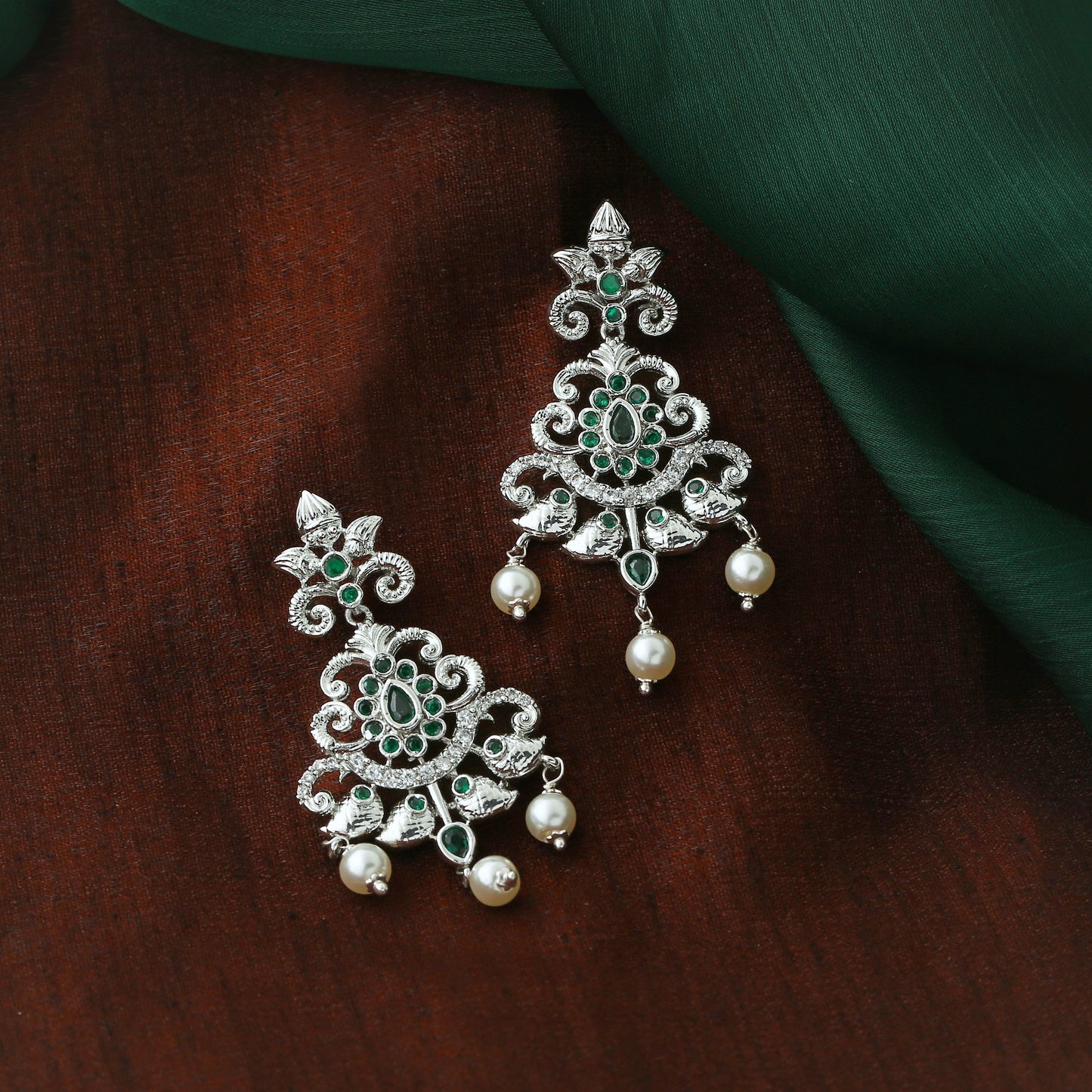 Estele Rhodium Plated CZ Swirling Symphony Earrings with Pearl & Green Crystals for Women