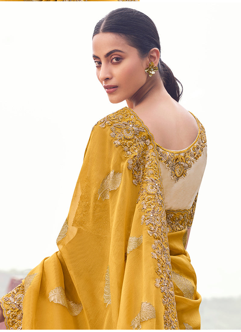 Monjolika Fashion Yellow Embroidered Woven Faux Tissue Silk Saree
