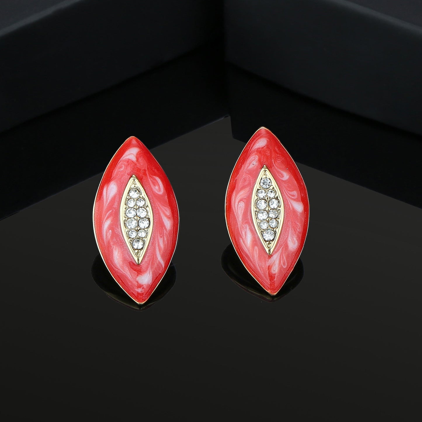 Estele RED Eye shaped fancy latest Studs for women
