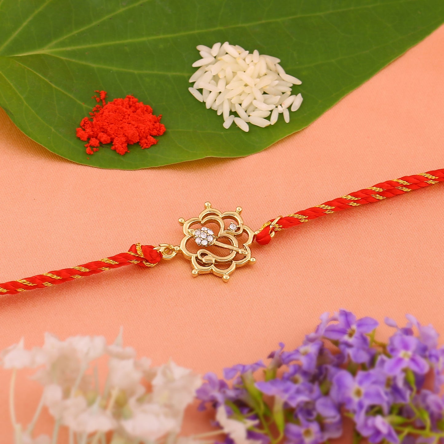 Gold Floral Om Crystal Rakhi
