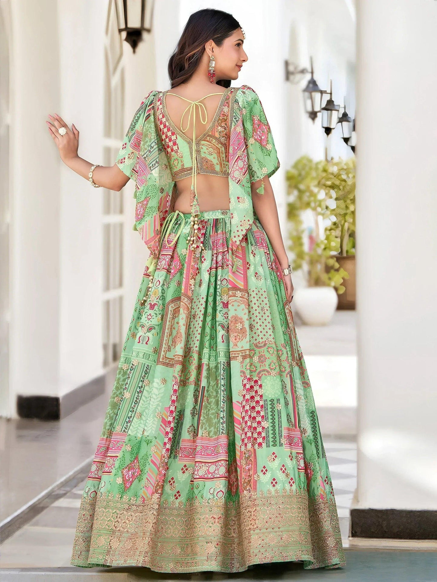 Tulsi Art Gorgeous Pista Green Chinon Dori Embroidered Lehenga Choli