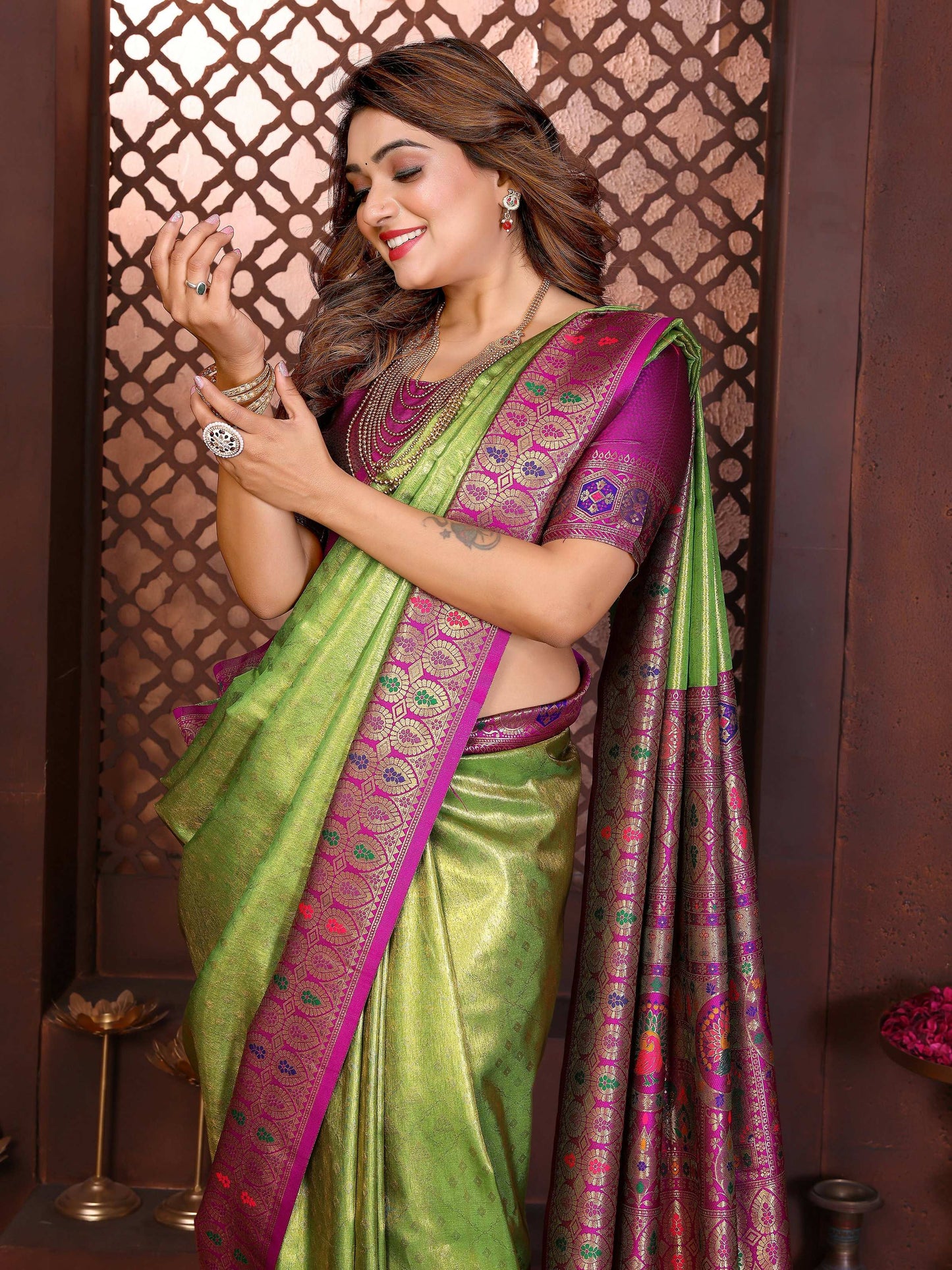 Aastha Fashion Green Tissue Silk Weaving Saree