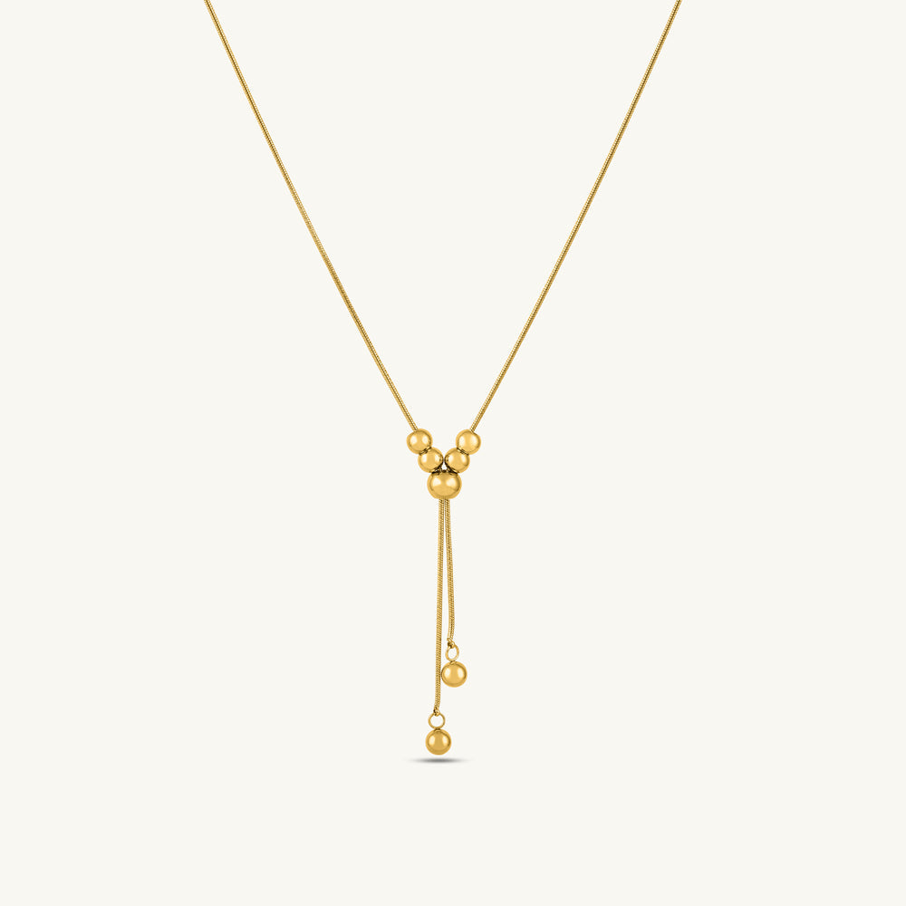 Gilded Bead Harmony Lariat Necklace