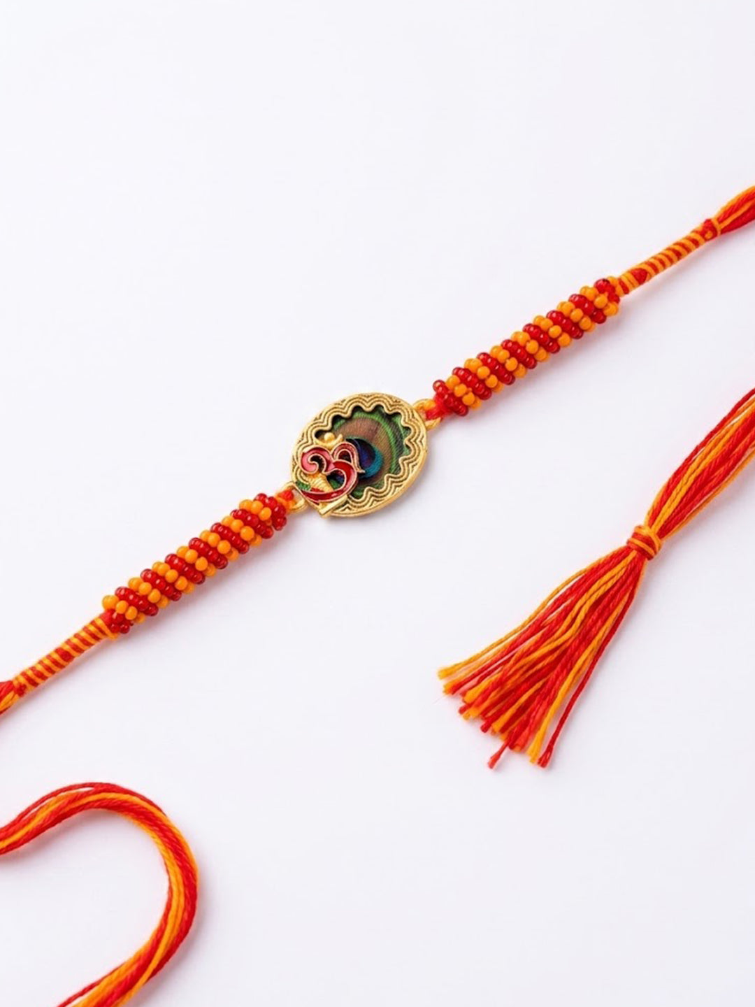 NVR Om Motif Divine Religious Thread Rakhi with Roli Chawal Chandan Mishri