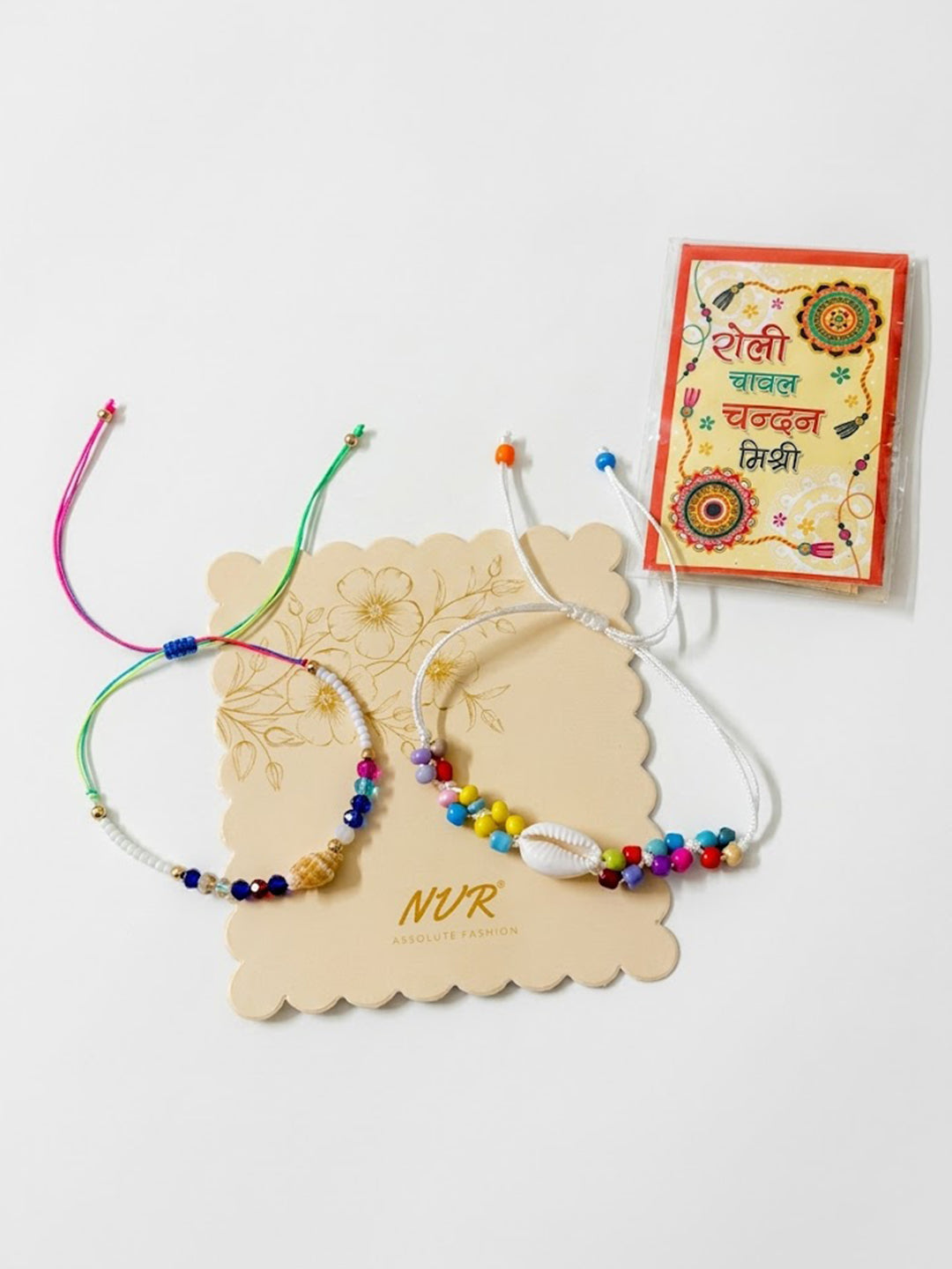 NVR Set of 2 Artificial Beads Thread Rakhi With Roli Chawal Chandan Mishri