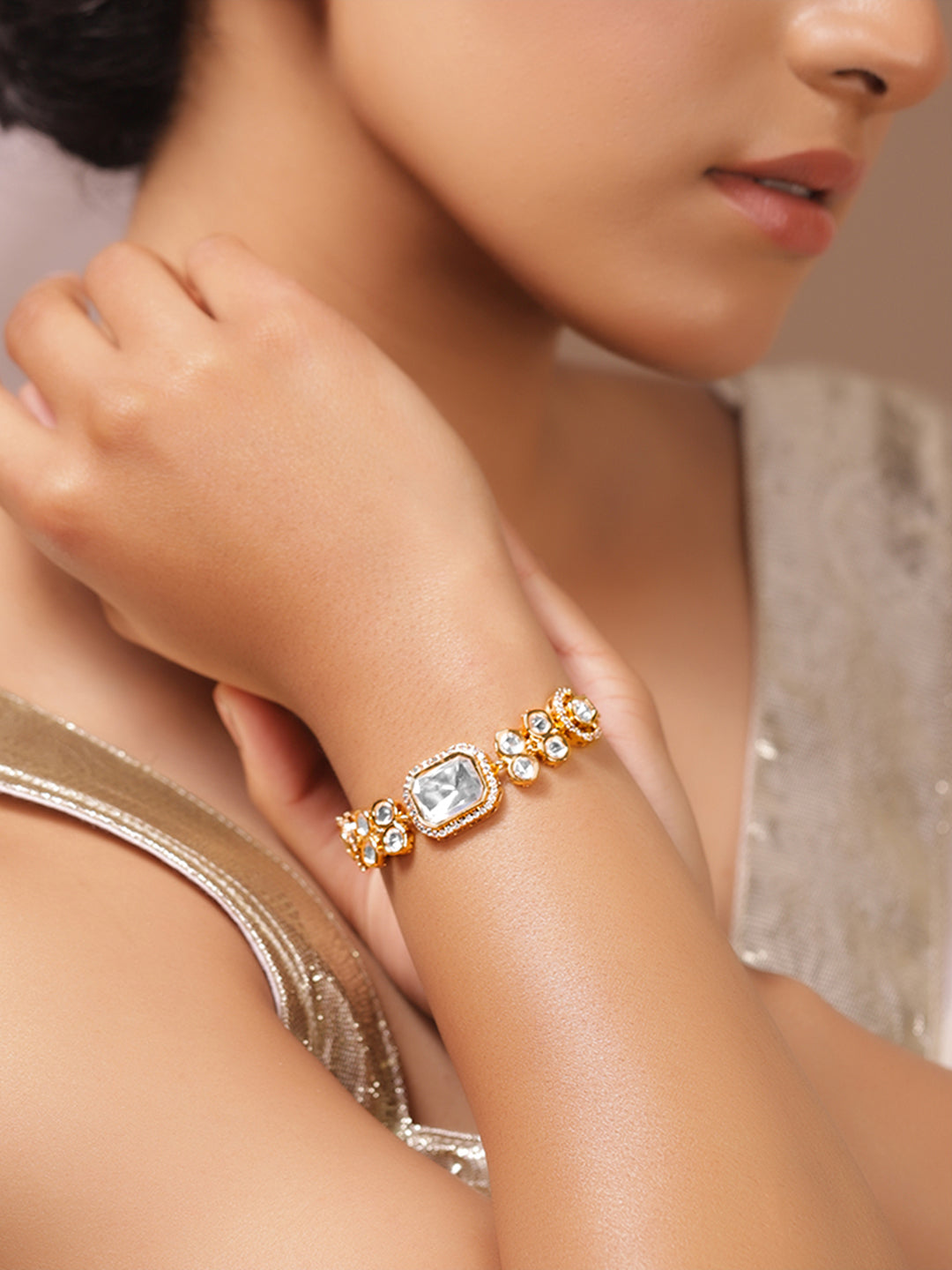 White Crystal Studded Gold Toned Bracelet