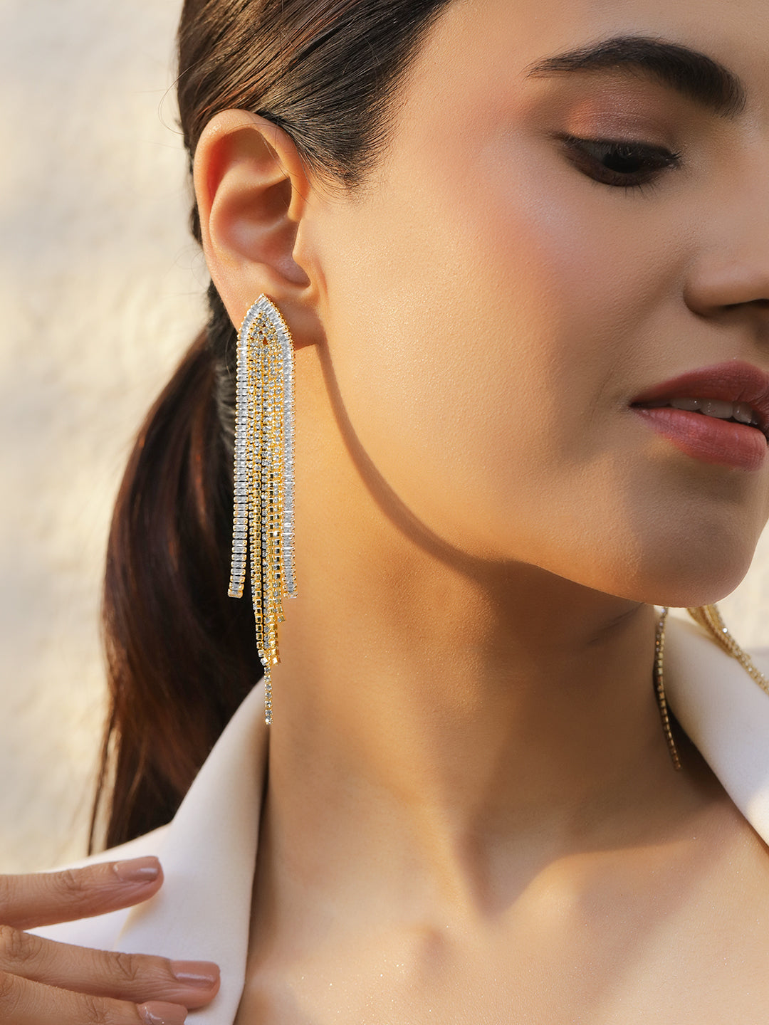 Gold Toned Crystal Studded Tassel Dangler Earrings