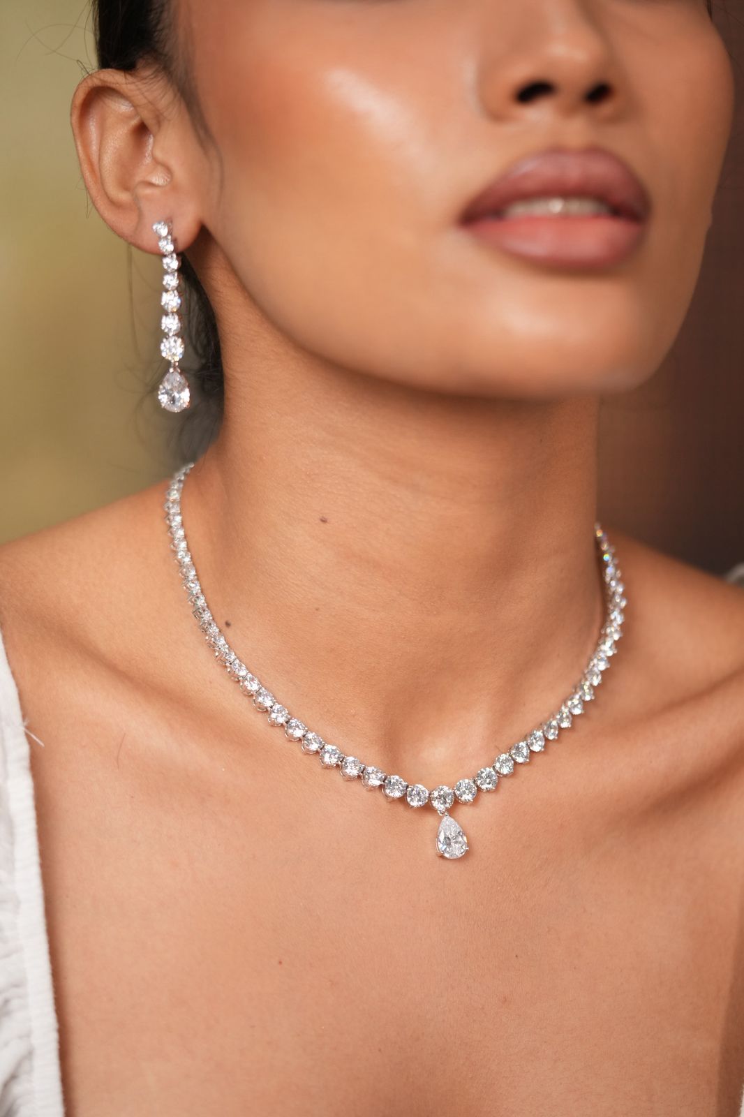 Lisa Round Solitaire Diamond Necklace With Pear Drop