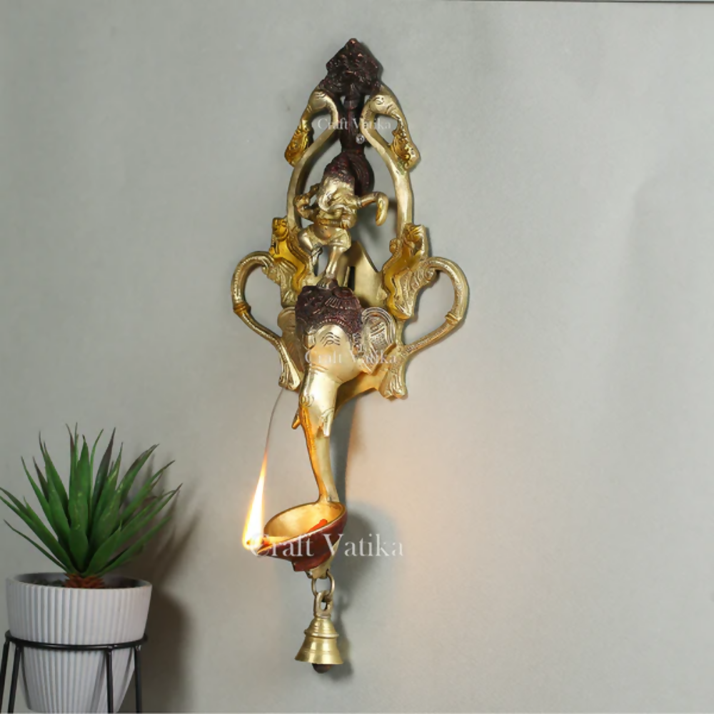 CraftVatika Ganesha Design Spiritual Brass Bell Oil Diya Lamp