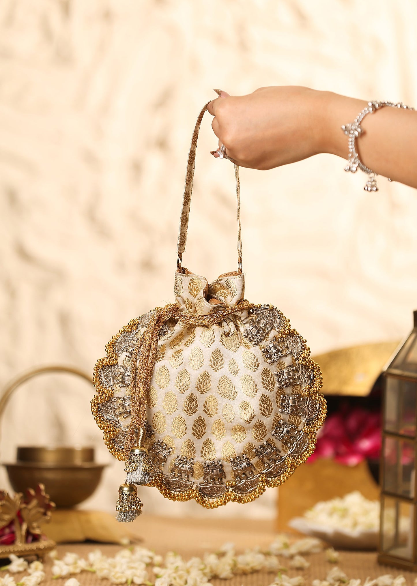 Gold Brocade Potli With Embellished Detailing