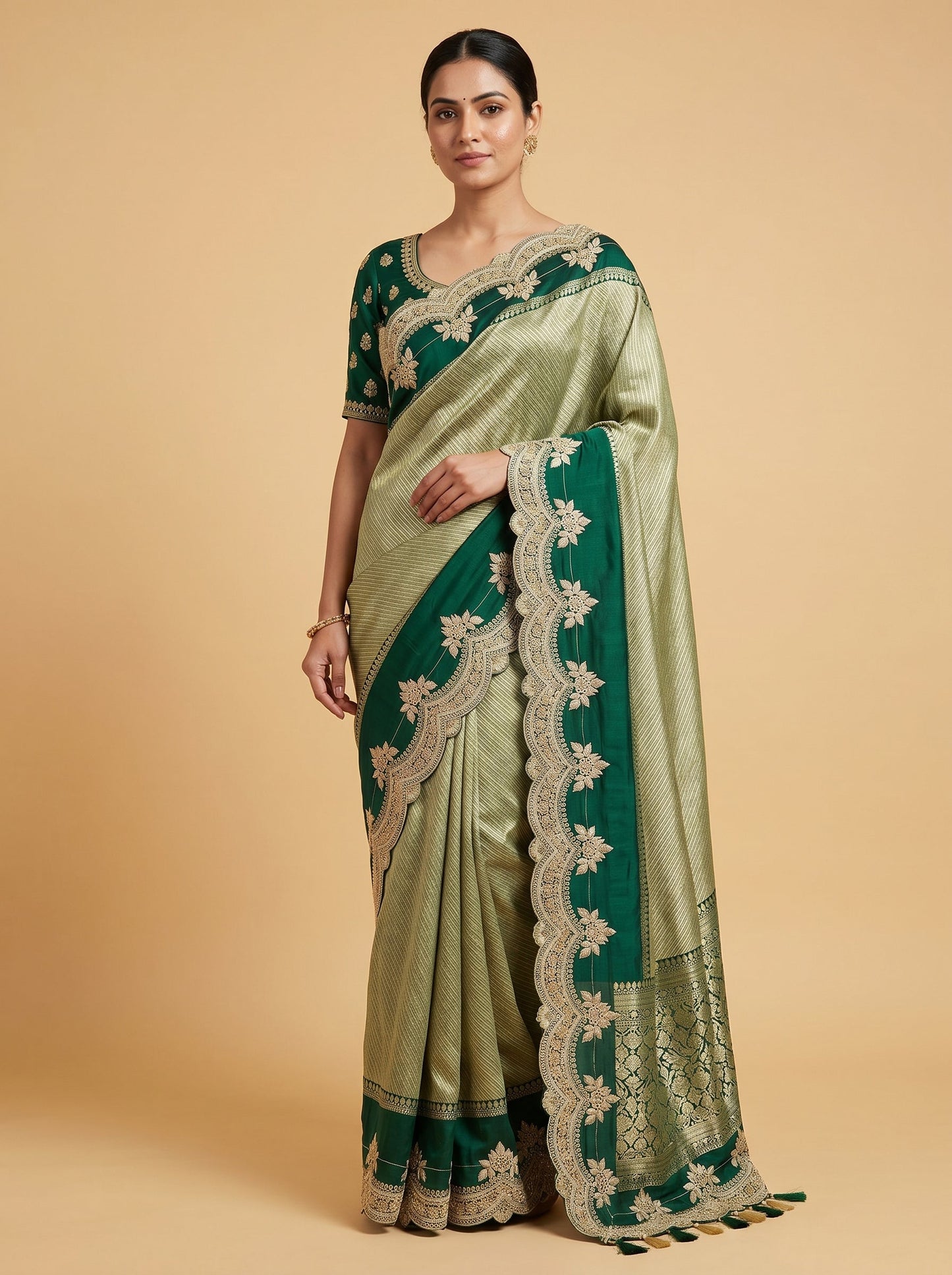 Green embroidered saree with zari detailing
