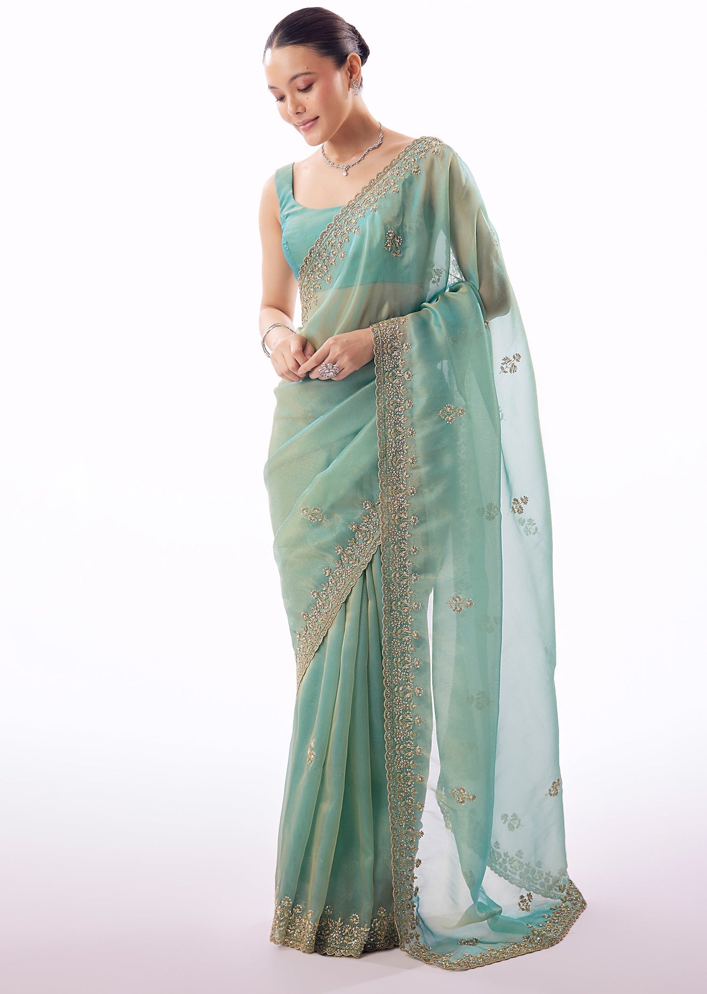 Light Turquoise Blue Tissue Saree And Cutdana Sequin Bead Embroidered Borders