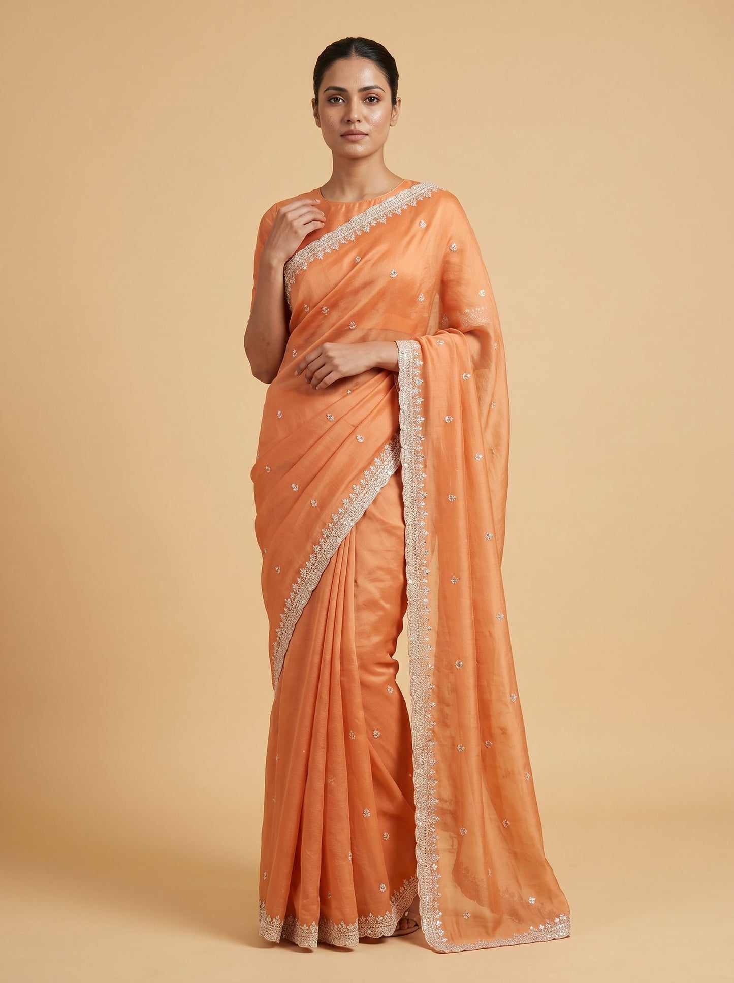 Orange Radiant Embroidered Saree