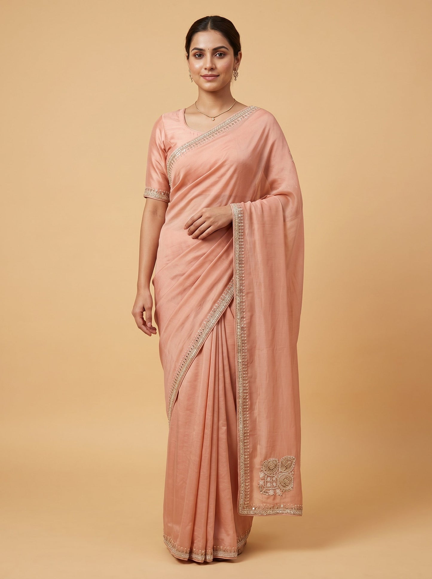 Peach Embroidered Saree with Soft Glow