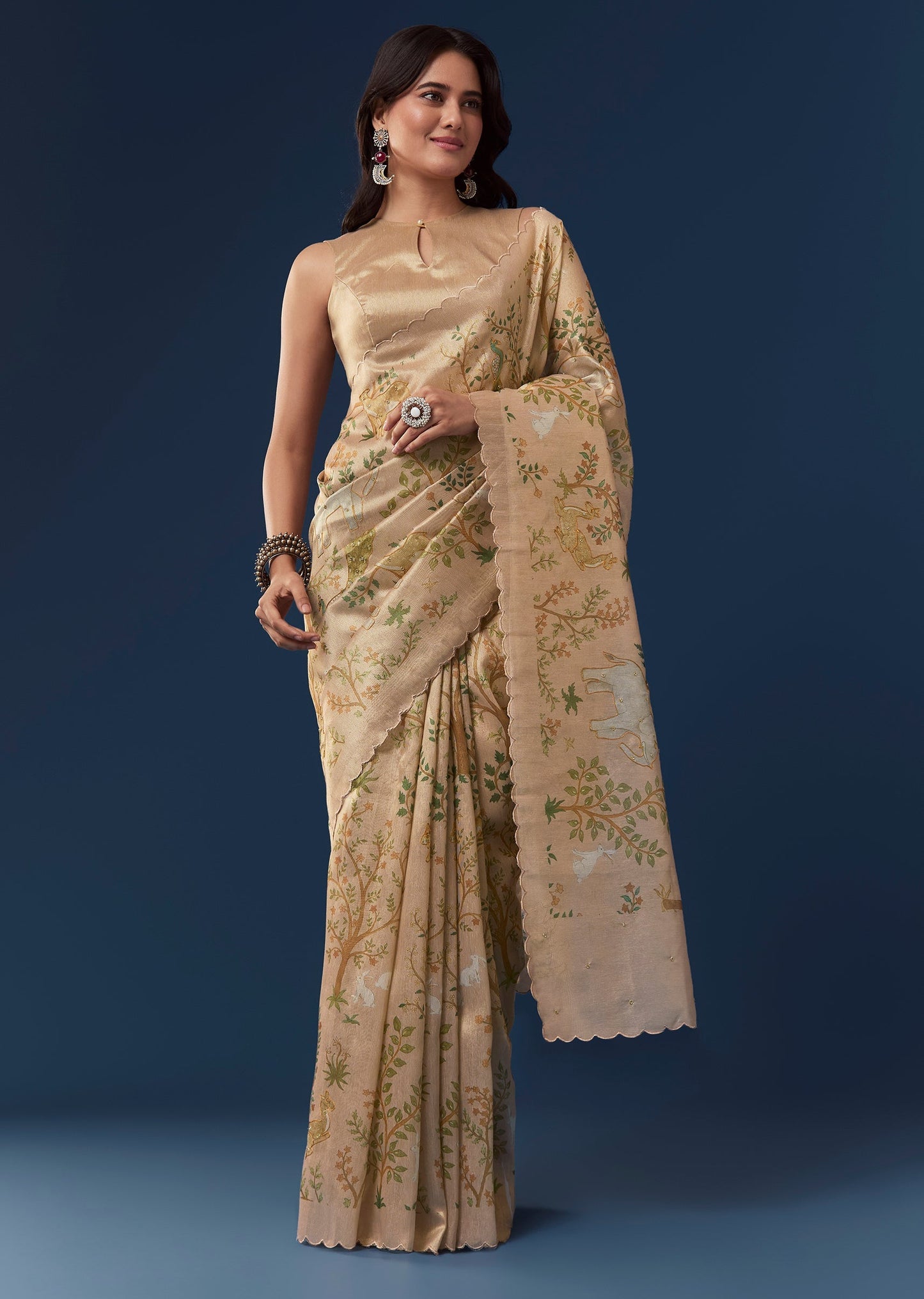 Peach Gold Tussar Saree With Scallop Border And Thread Work Motifs