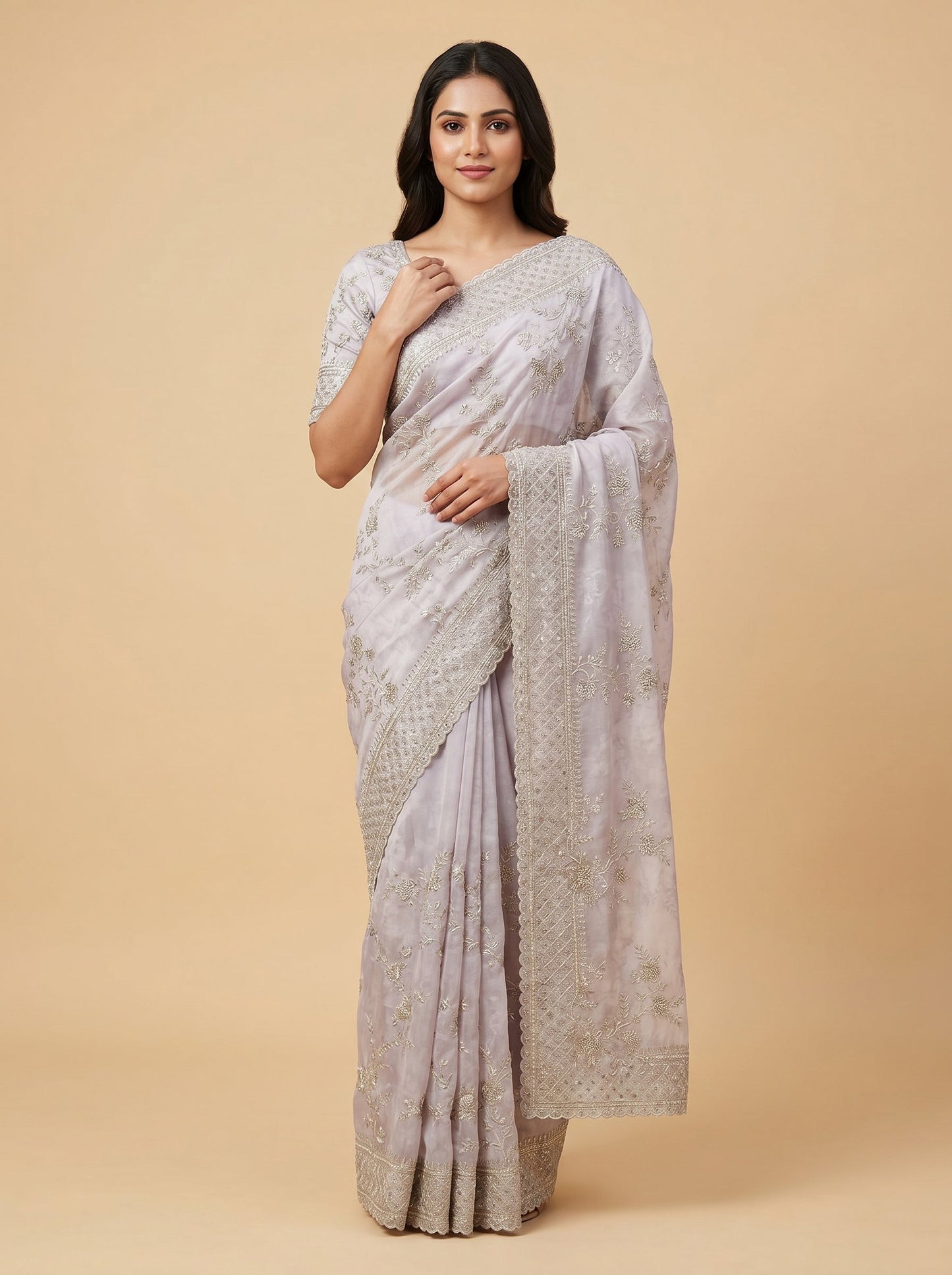 Pink embroidered saree with soft motifs