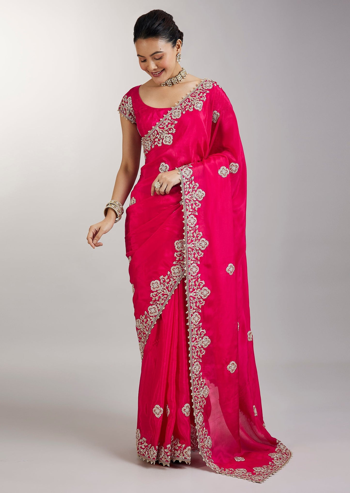 Rani Pink Embroidered Crepe Saree