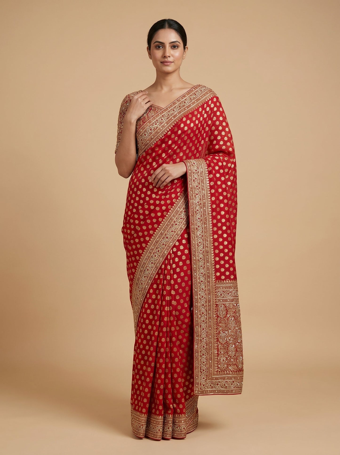 Red embroidered saree with intricate design