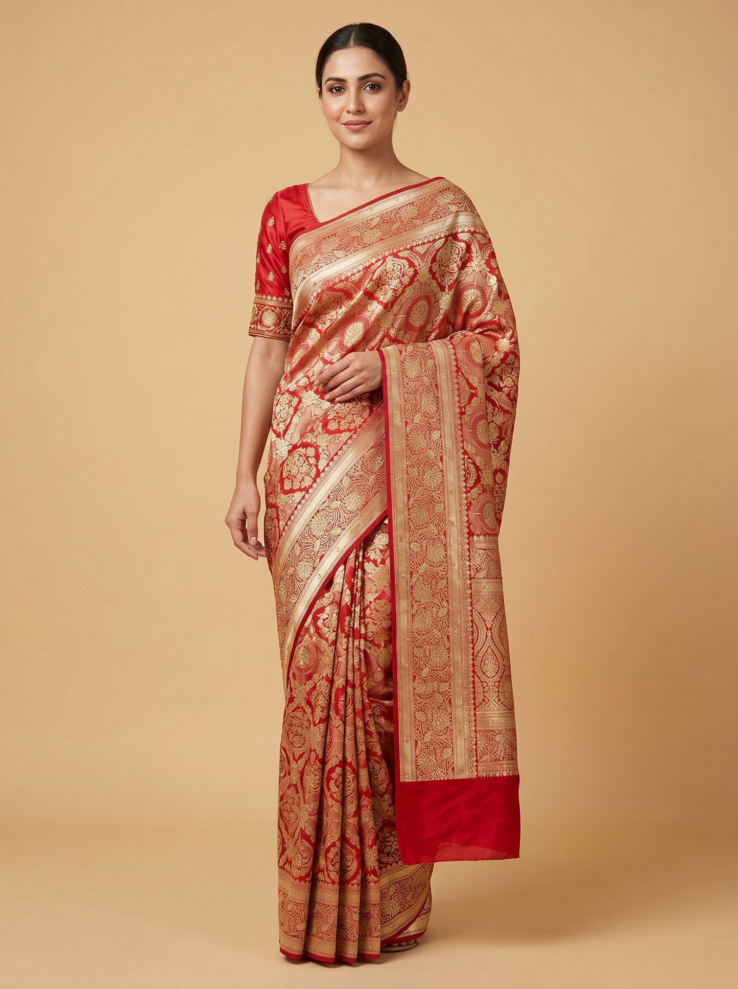 Red embroidered saree with rich zari work