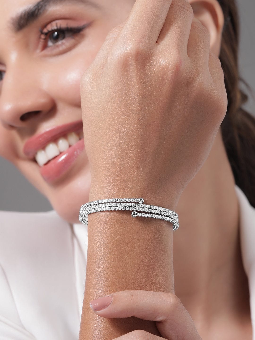 Rubans Rhodium-Plated Cubic Zirconia Studded Triple Line Bangle Style Bracelet