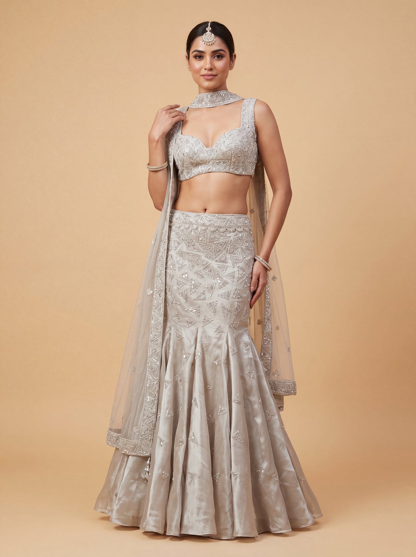 Oyster Contemporary Bridal Lehenga With Sheer Embroidered Volume