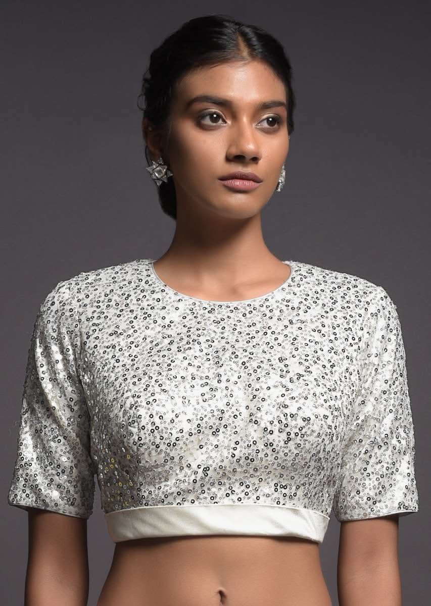 Silver White Blouse Embellished In Sequins With Satin Hemline And Half Sleeves Online - Kalki Fashion