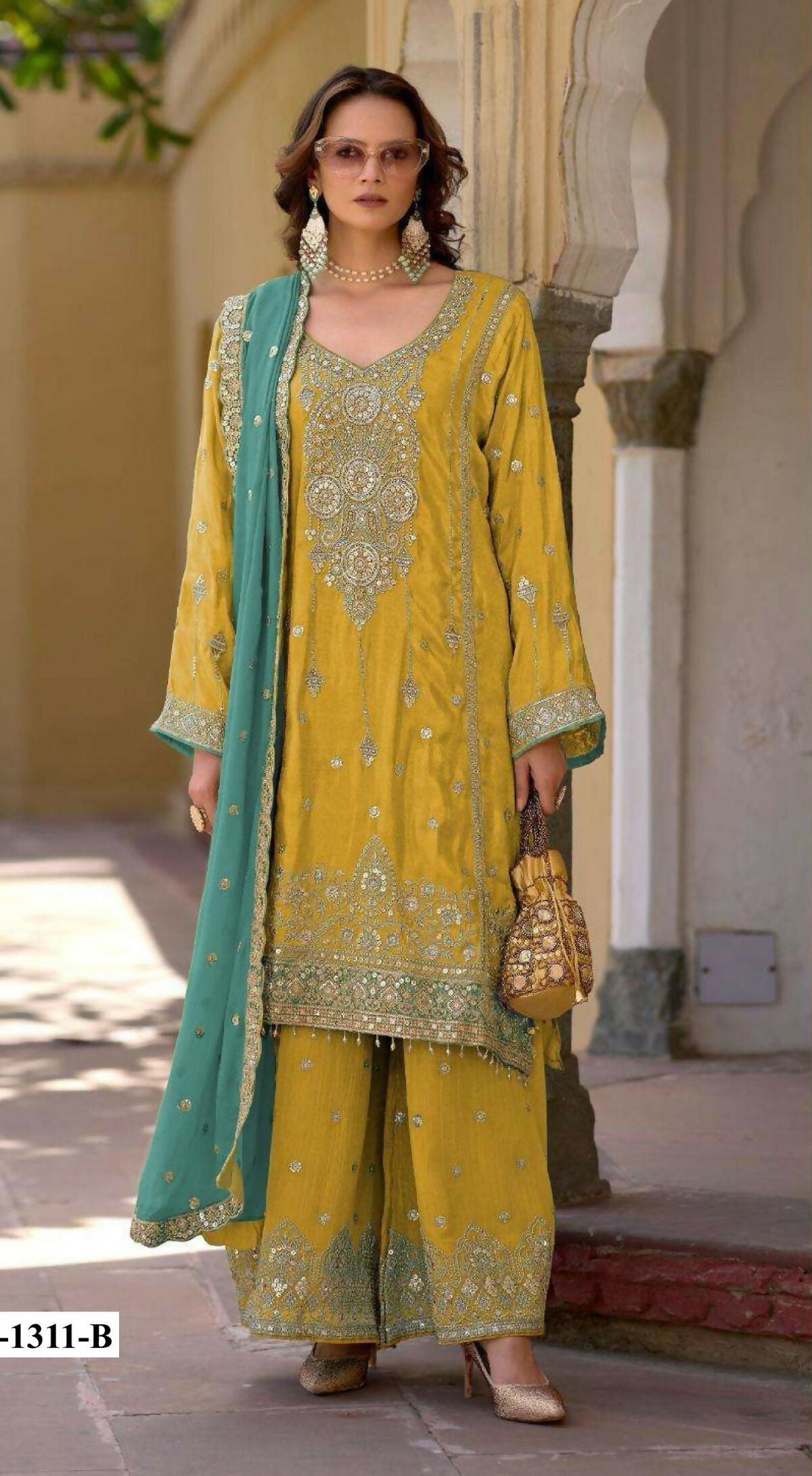 Anaita Yellow Heavy Chinon Suit With Embroidery Bits Work