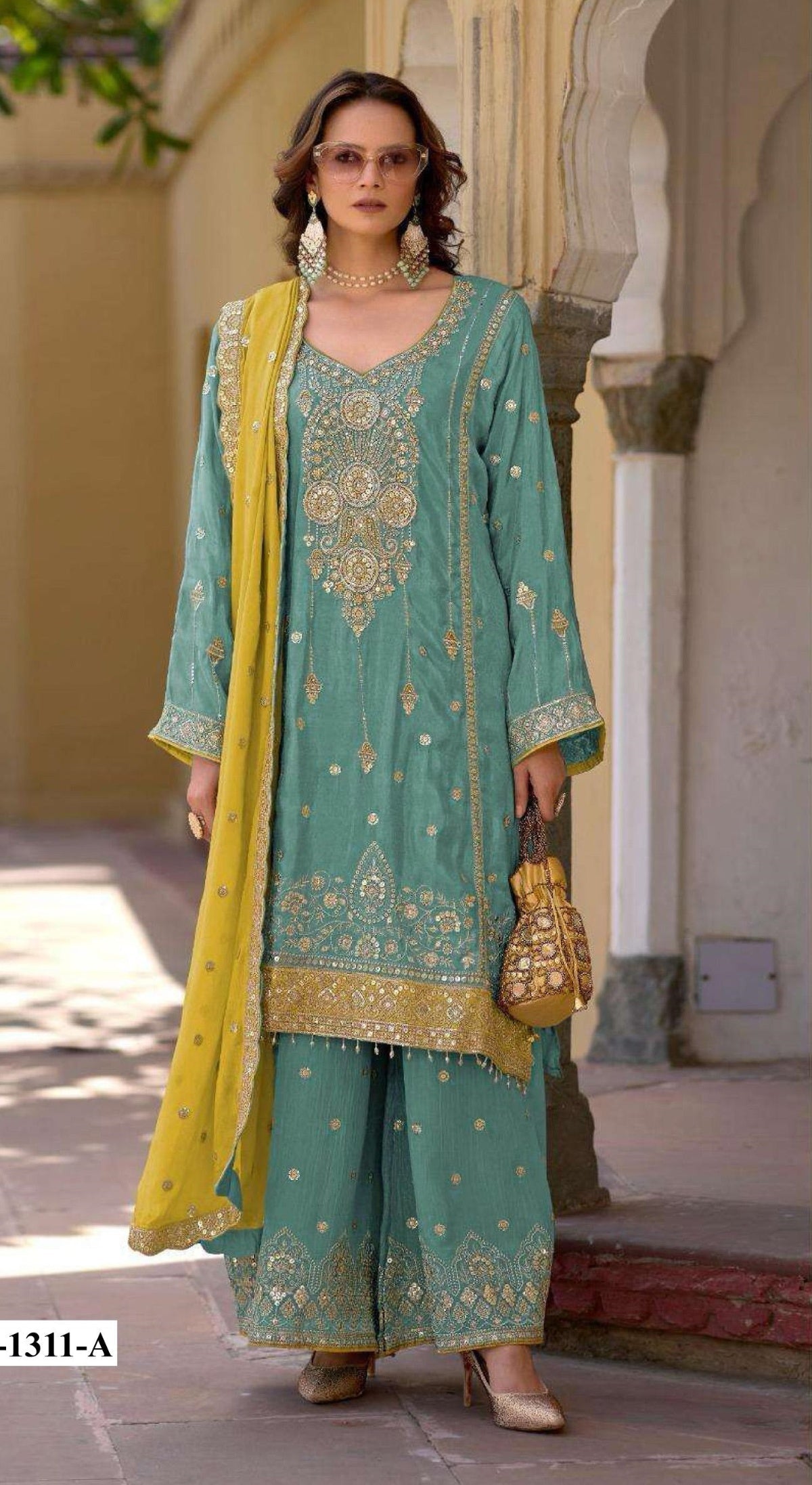 Anaita Sky Blue Heavy Chinon Suit With Embroidery Bits Work