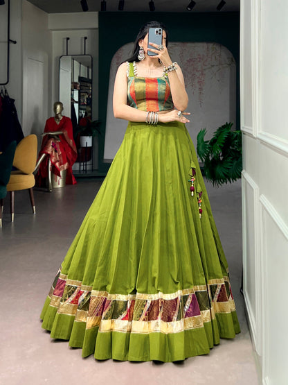 Lorenvalley Fashion Parrotgreen Cotton Enhanced With Zari Weaving, Embossed Design Work Lehenga Choli