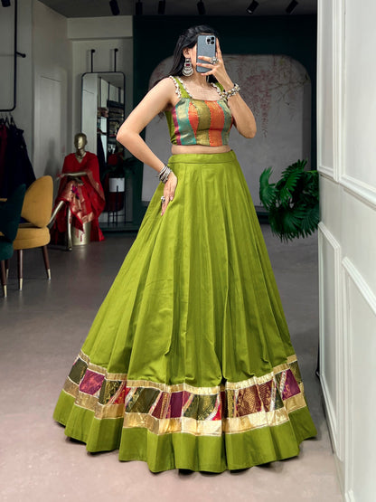 Lorenvalley Fashion Parrotgreen Cotton Enhanced With Zari Weaving, Embossed Design Work Lehenga Choli