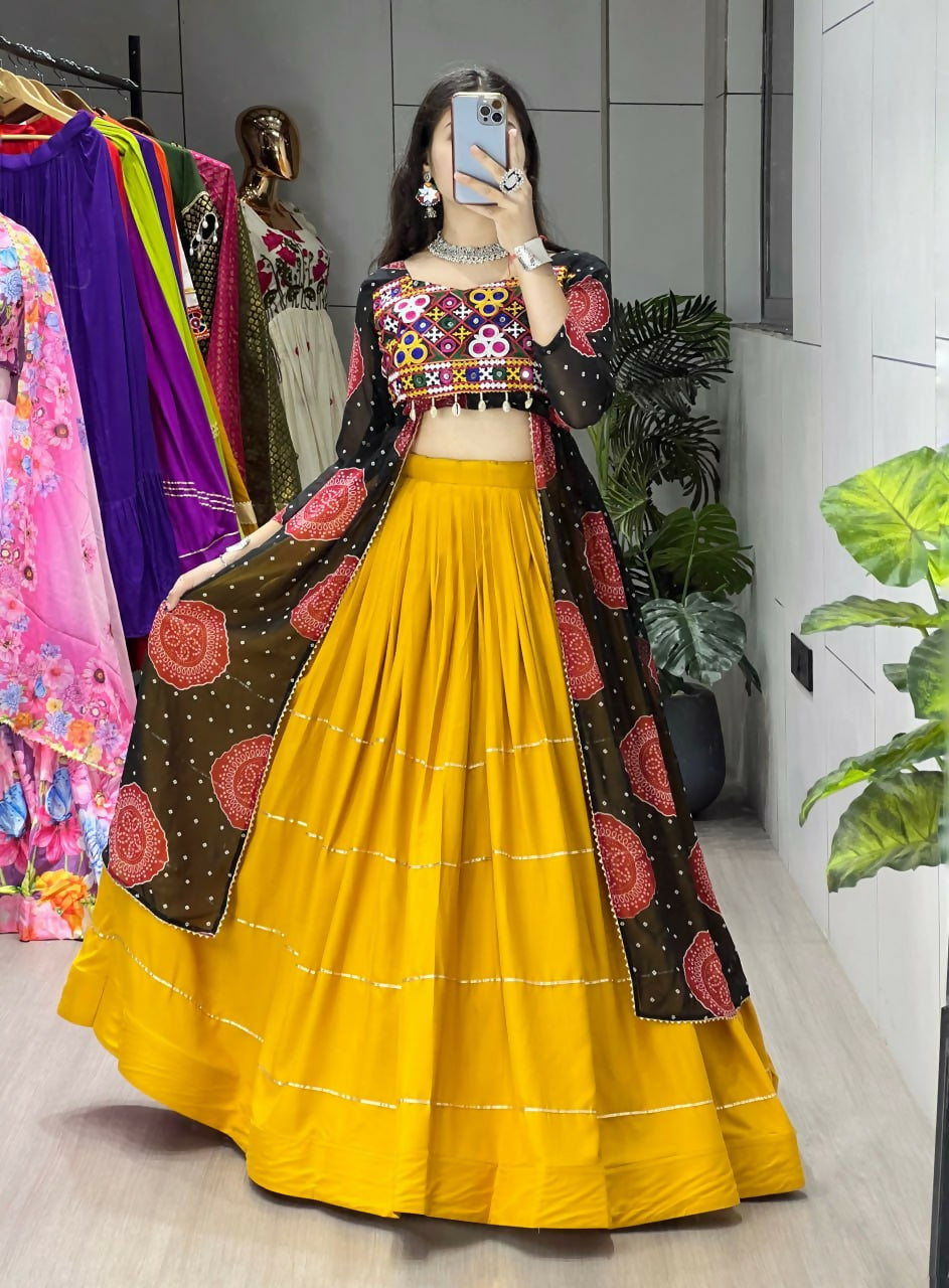 Yash Enterprise Mustard Black Rayon Cotton Embroidery Semi Stitched Navratri Chaniya Choli