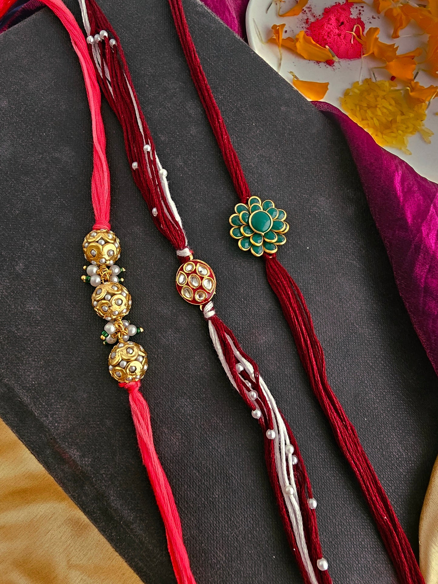 The Auspicious Trinity Rakhi Set