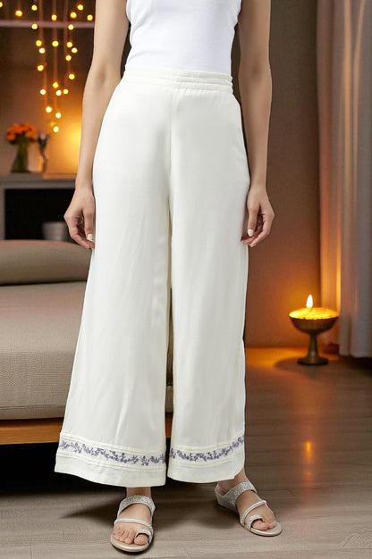 W for Woman Ecru Embroidered Rayon Parallel Pants With Pleats.