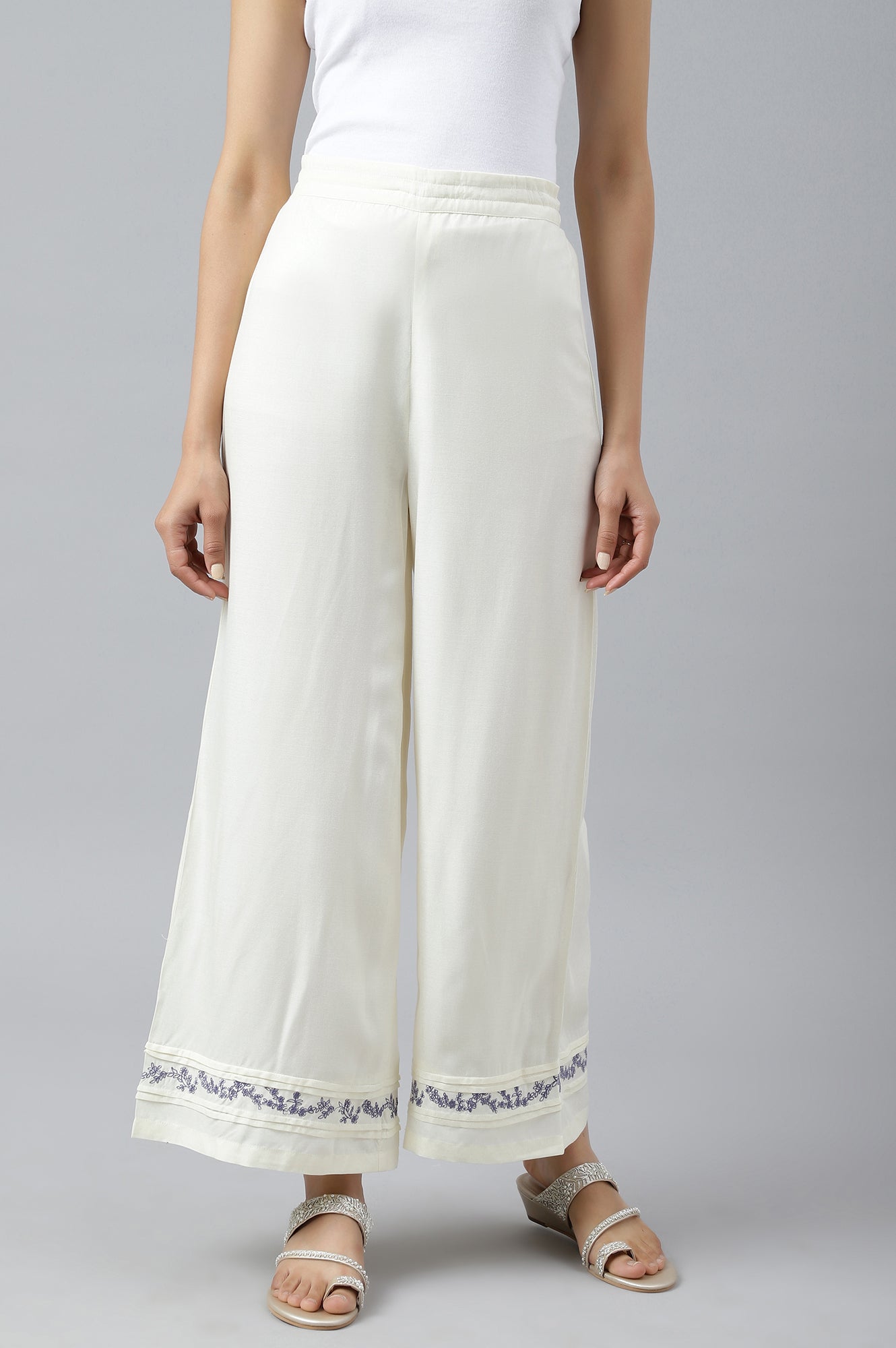 W for Woman Ecru Embroidered Rayon Parallel Pants With Pleats.
