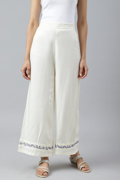 W for Woman Ecru Embroidered Rayon Parallel Pants With Pleats.