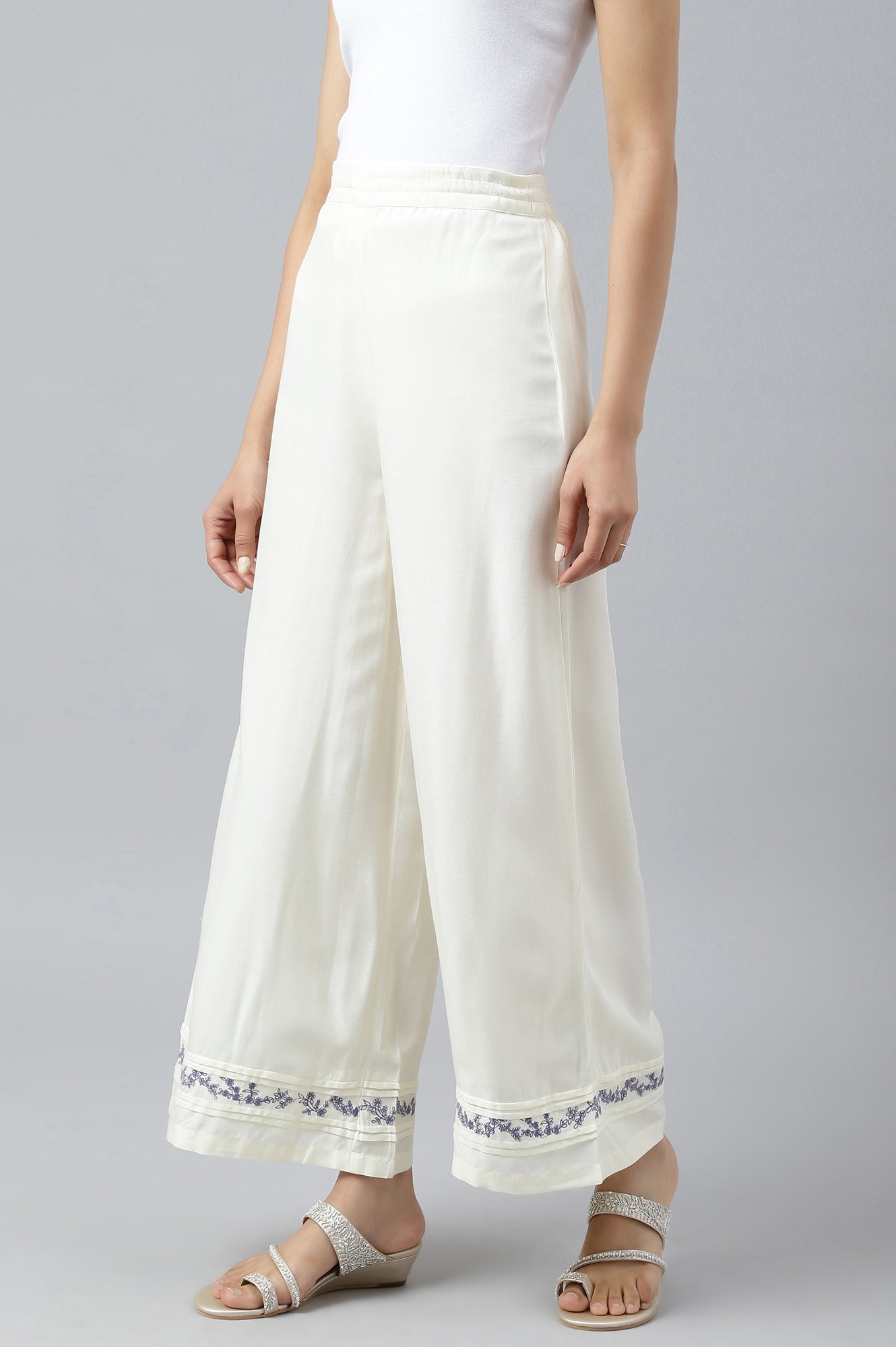 W for Woman Ecru Embroidered Rayon Parallel Pants With Pleats.