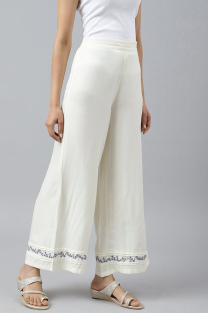 W for Woman Ecru Embroidered Rayon Parallel Pants With Pleats.