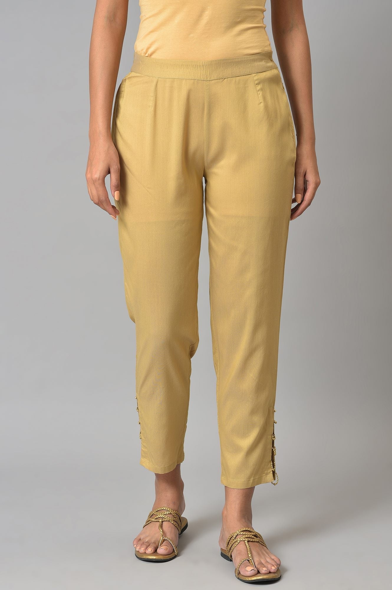 W for Woman Gold Solid Light Festive Slim Pants