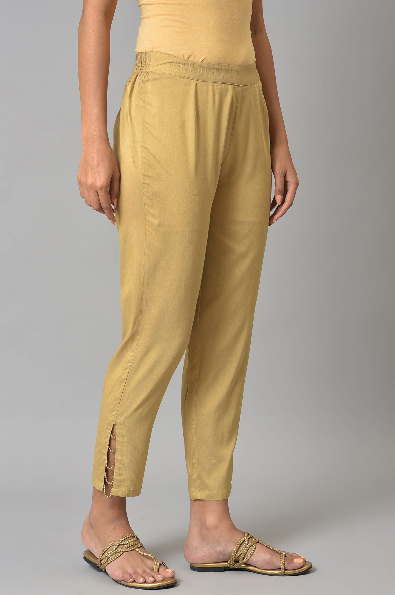 W for Woman Gold Solid Light Festive Slim Pants