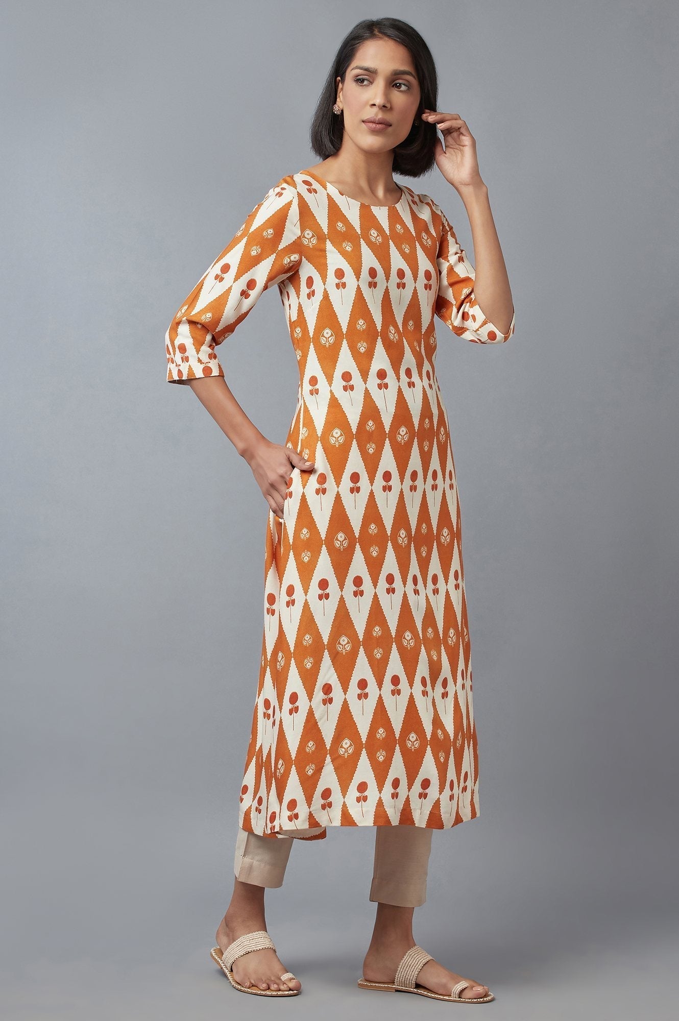 W for Woman Orange Rust and Ecru Printed A-line kurta
