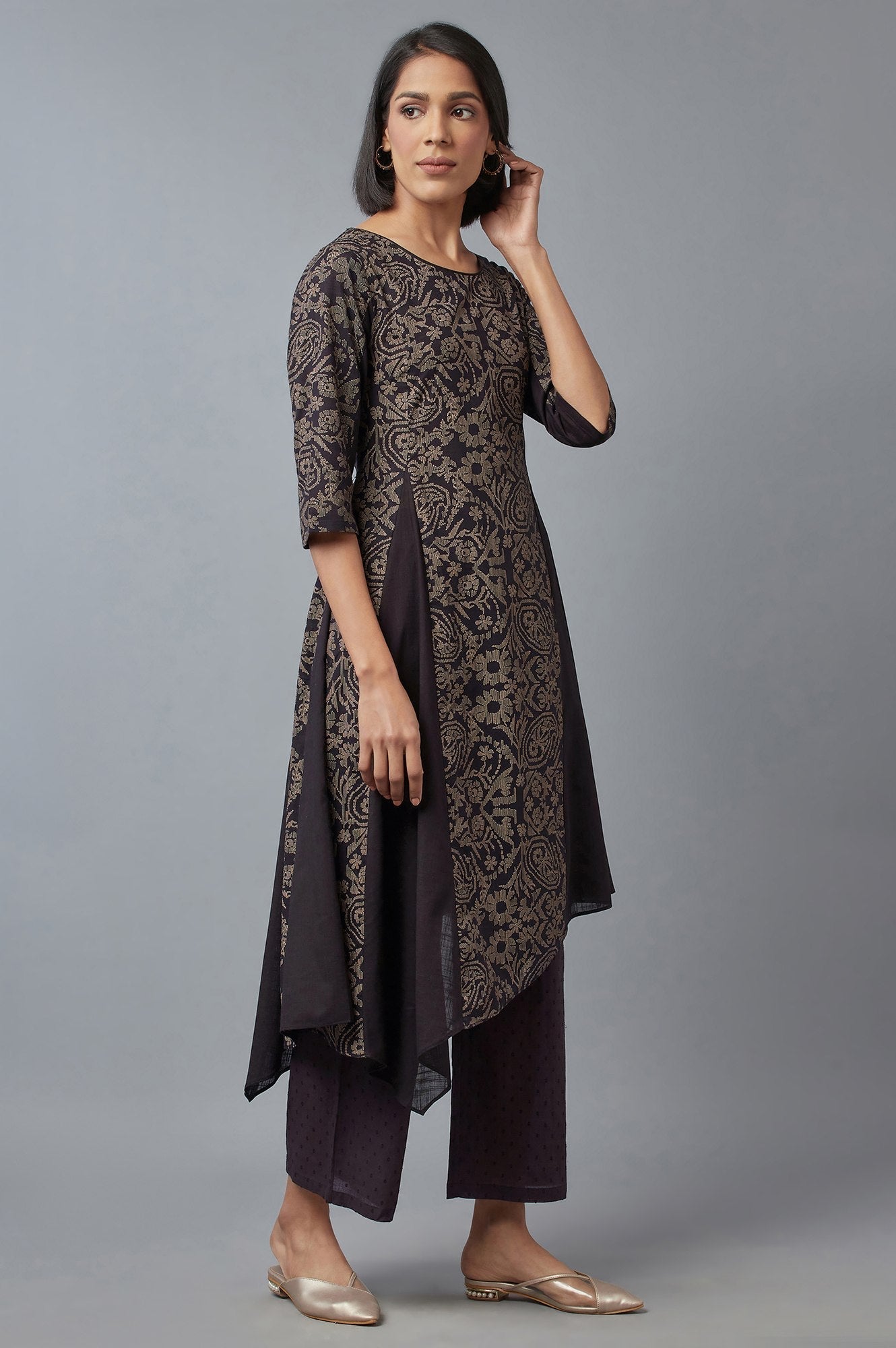 W for Woman Black Floral Print Asymmetric kurta in Round Neck