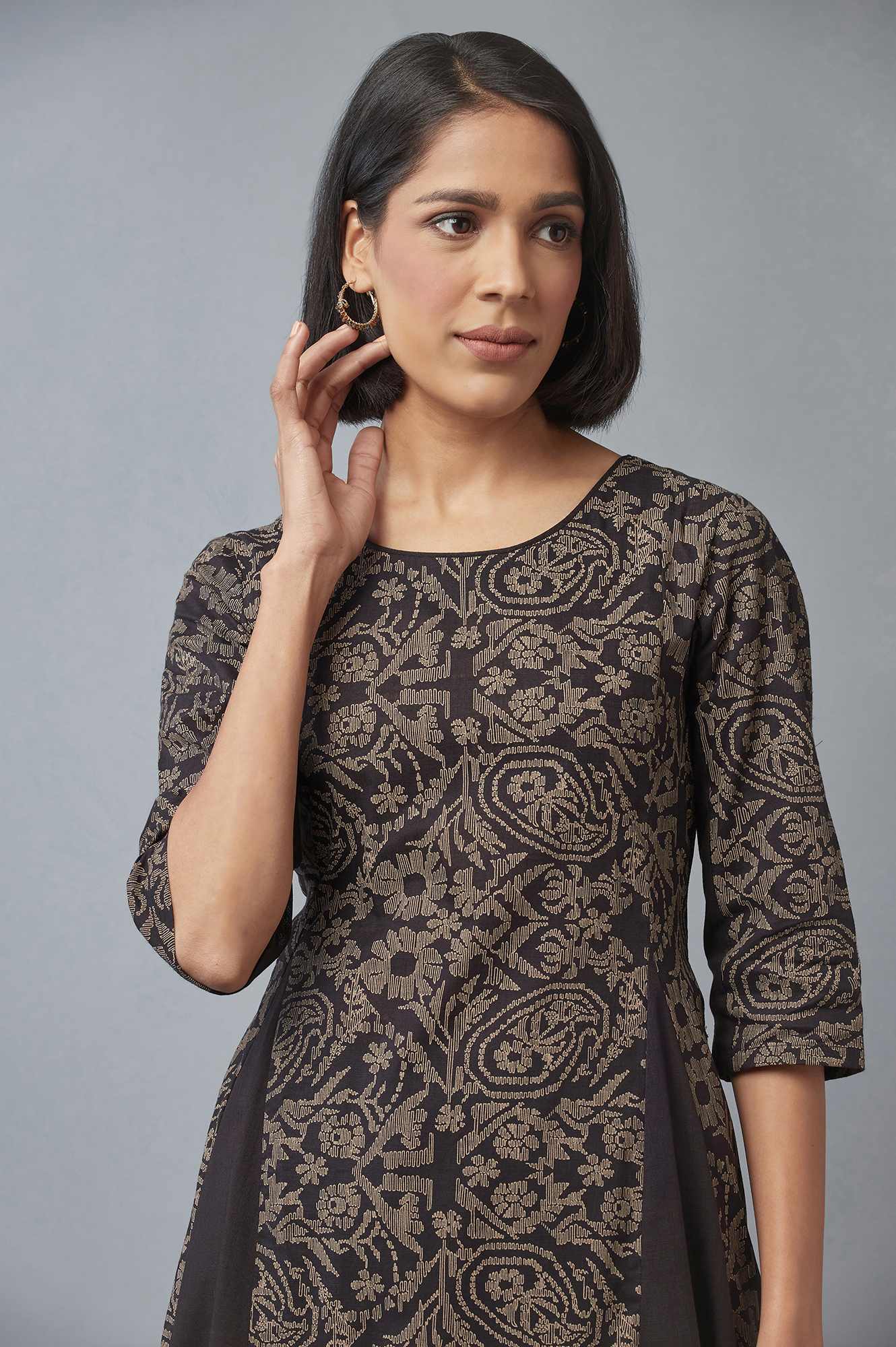 W for Woman Black Floral Print Asymmetric kurta in Round Neck