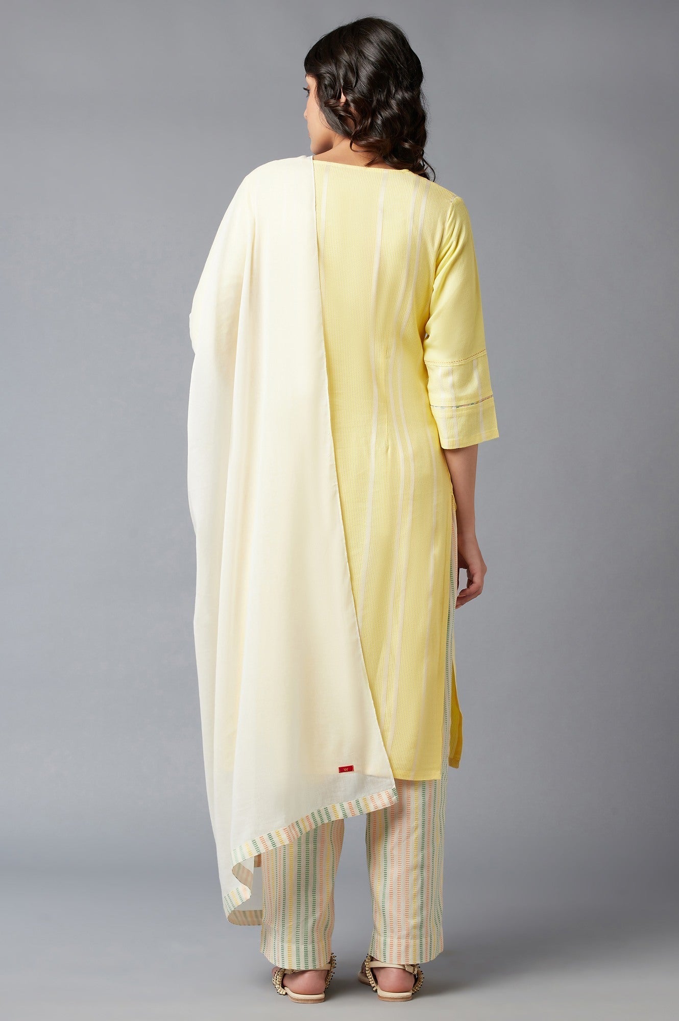 W for Woman Light Yellow Dobby Straight kurta With Parallel Pants And Ecru Dupatta