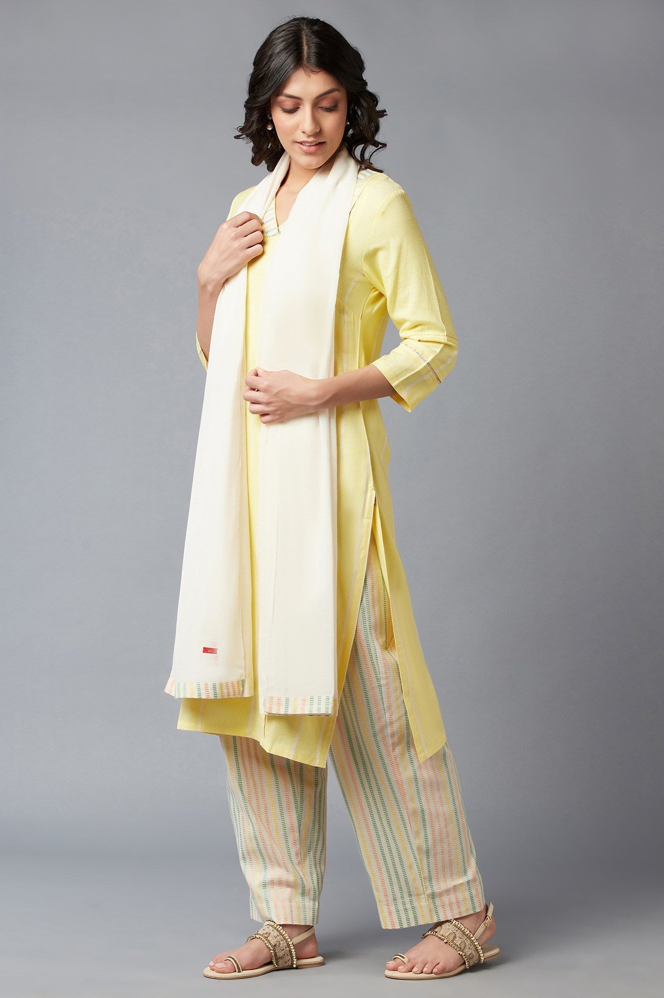 W for Woman Light Yellow Dobby Straight kurta With Parallel Pants And Ecru Dupatta