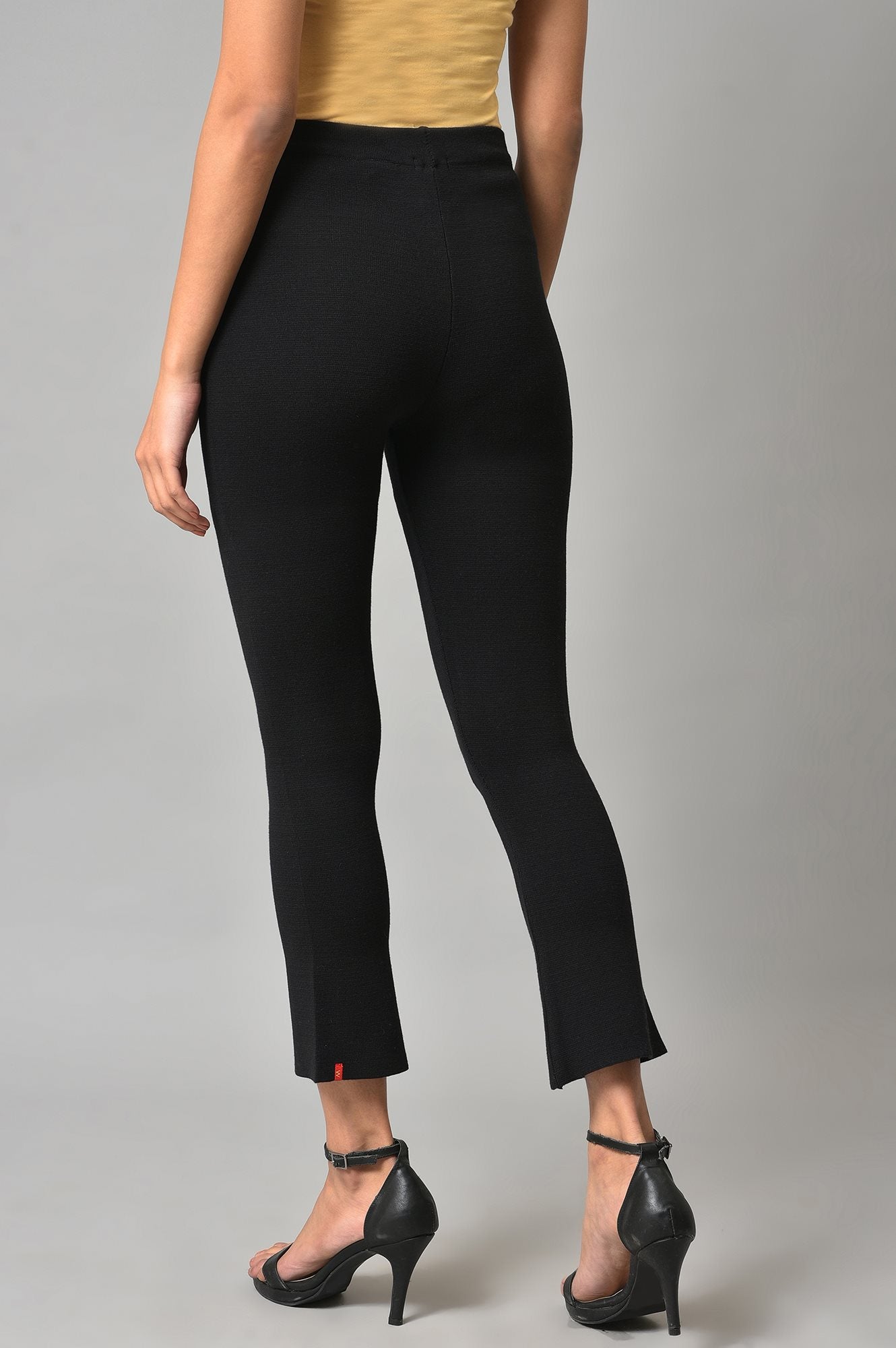 W for Woman Black Solid Knitted Flared Pants